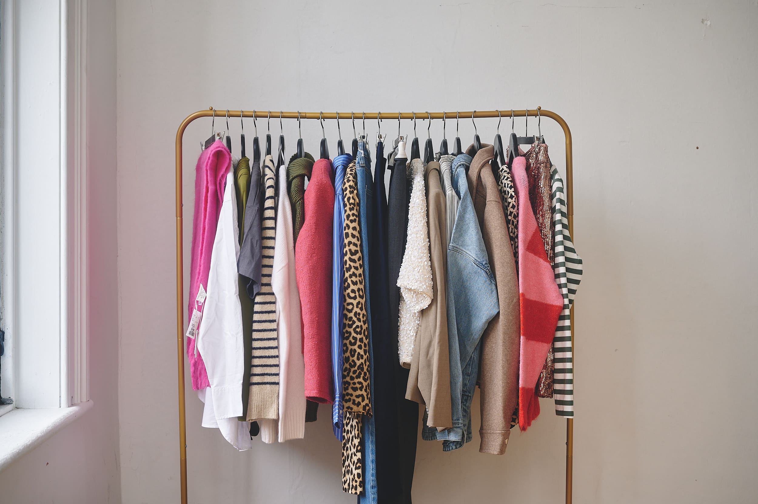 Why work with a stylist? Clothing rack